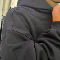 FELPA ZIP CAPPUCCIO NERA