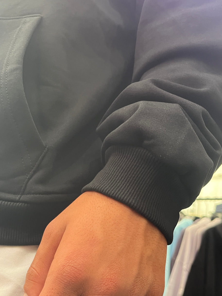 FELPA ZIP CAPPUCCIO NERA
