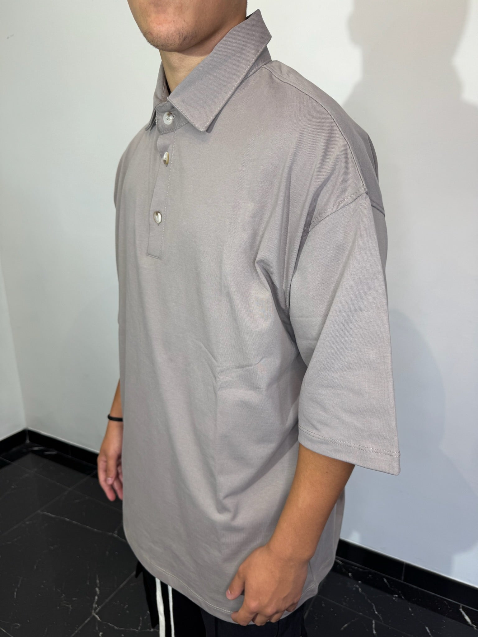 POLO CON BOTTONI FANGO