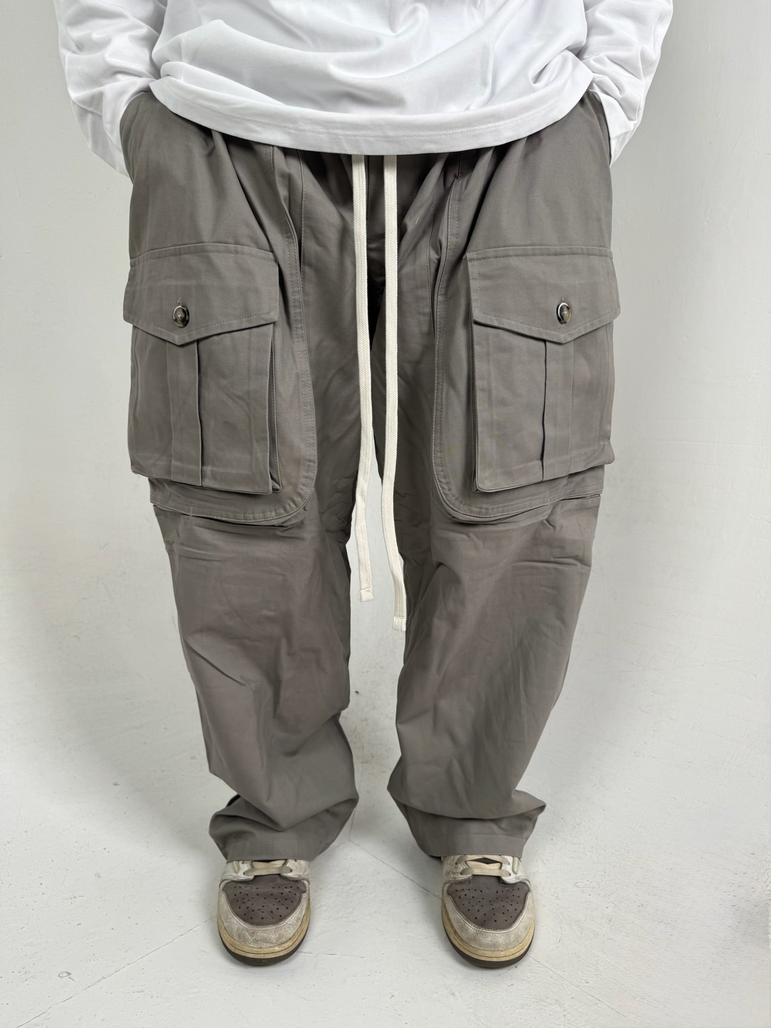 PANTALONI TASCHE FRONTALI CON BOTTONE FANGO