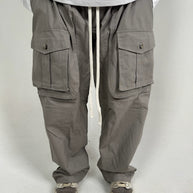 PANTALONI TASCHE FRONTALI CON BOTTONE FANGO